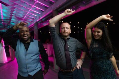 Guests dance at wedding reception