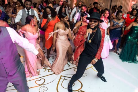 Guests dance at wedding reception